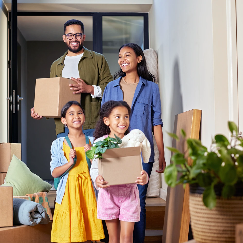 Happy family moving into new home
